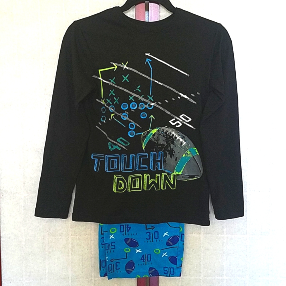 Circo Black and blue football long-sleeved pajama set. Kid's size L (12-14).